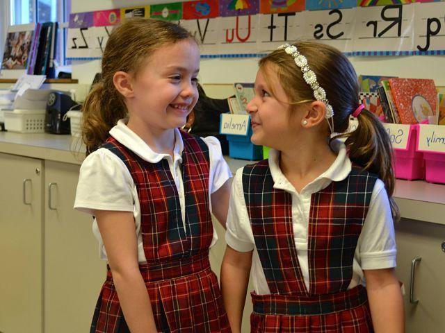 Two kindergarten girls in uniform